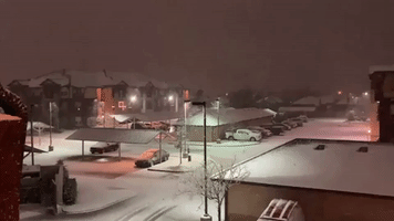 Snow Covers Rooftops in Norman as Wintry Blast Hits Oklahoma