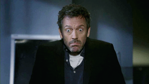 TV gif. Hugh Laurie as Dr. House in House stares with big eyes as he throws out his hands in a shrug.
