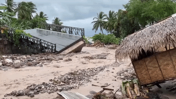 Tropical Storm Nalgae Destroys Bridge in South Philippines