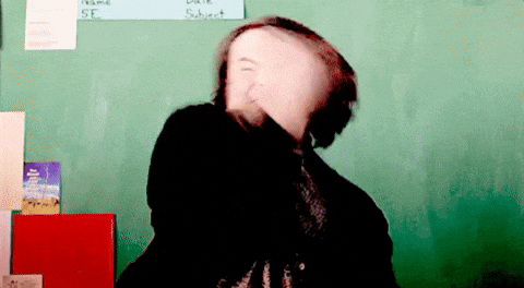 Movie gif. Jack Black as Dewey in School of Rock stands in front of a chalkboard and gives us a hearty salute.