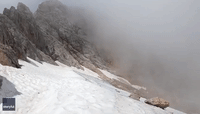 Mountain Climber Films Treacherous Ascent of Austrian Peak