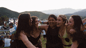 insomniacevents love happiness music festival group hug GIF
