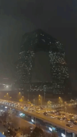 Buildings Veiled by Smog in Beijing as Government Issues Yellow Alert for Air Pollution