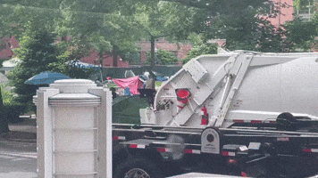 Tents From George Washington University Encampment Tossed Into Garbage Truck