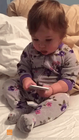 Adorable Baby Girl Makes an 'Important Business Call'