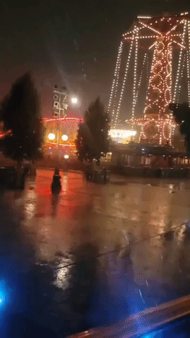Disneyland Visitors Take Shelter From Southern California Thunderstorms