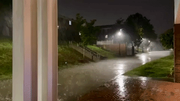 Water Cascades Down Steps as Heavy Rain Hits Mississippi