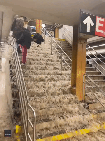 Water Gushes Down Subway Stairs During Flooding in Brooklyn