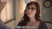 TV gif. Sara Rue as Dora on Impastor looks up at a man, nodding, and then sarcastically saying, “Good Luck with that.”