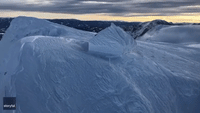 Stunning Footage Captures Building Completely Covered by Snow in Austrian Mountains