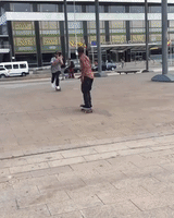 Man Performs Impressive Skateboard Jump in Reverse