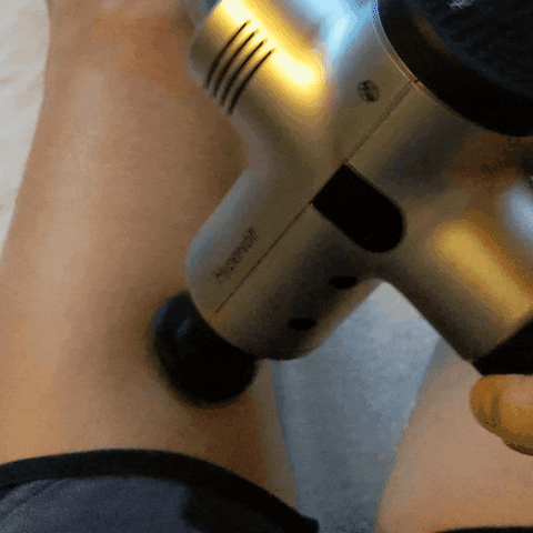 triathletemag giphyupload recovery triathlon theragun GIF