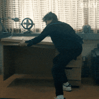 Sponsored gif. Person throws a wooden desk through a wall and it crashes into a hallway filled with students. In the upper right corner is the logo for the Amazon Prime show Gen V.