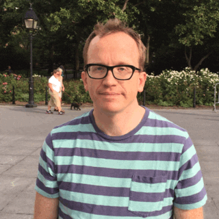 Video gif. Chris Gethard shrugs dramatically as if to say, “I don’t know.”