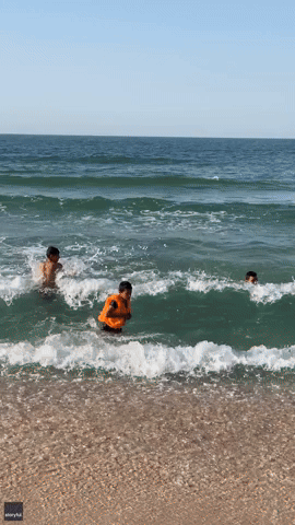 Palestinian Children Enjoy Swim in Sea During Gaza Ceasefire