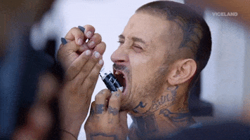 tooth GIF by KING OF THE ROAD