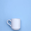 Stop motion gif. A cloud rains coffee beans over a coffee mug and lightning strikes it, cooking the coffee, and a little bit of steam comes out.