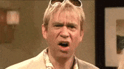 SNL gif. Comedians Kristen Wiig, Bill Hader, and Fred Armisen exchange shocked, slack-jawed expressions, parodying The Californians. 