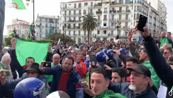 Algerian Riot Police Leave Protest Site as Crowds Remain