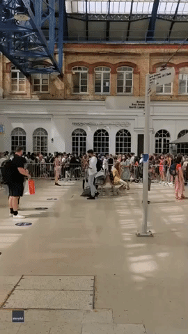 Crowds Arrive by Train to English Seaside Amid Heat Wave