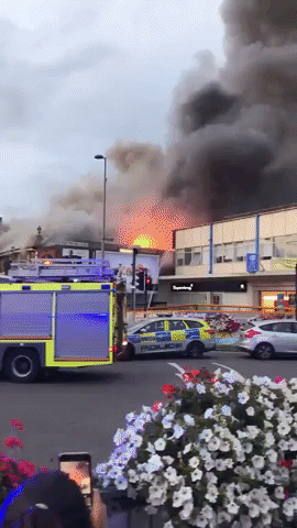 Firefighters Battle Blaze at Poundland in Chingford
