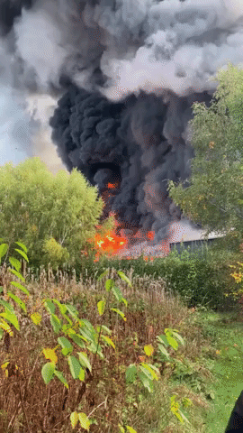 Bystanders Get Close View of Industrial Fire in Wales