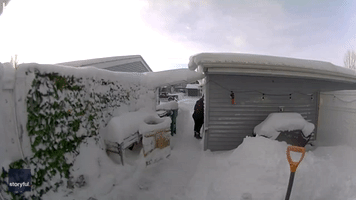 North Dakota Woman Cops 'Baptism' of Snow After Shutting Garage Door