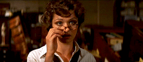 Movie gif. Rachel Weisz as Evelyn O'Connell in The Mummy takes off her glasses, shocked, saying "Oops."
