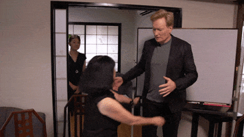 hugging hug GIF by Team Coco