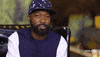 TV gif. In a baseball cap, Desus from Desus and Mero shakes his head and says, “No.” He then motions his hand as if to say, “Stop.”