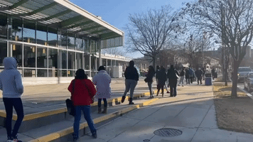Dozens Line Up for Free At-Home Rapid Tests at DC Library