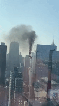 Black Smoke Rises in Manhattan After Crane Collapse