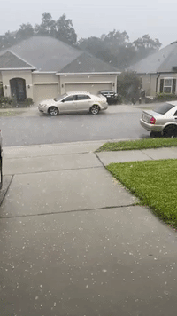Hail Stone Bounce and Fall on Cars and Driveways in Groveland, Florida
