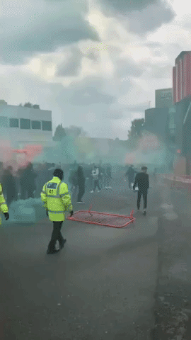 Premier League Match Postponed as Anti-Glazer Protesters Take to Pitch at Manchester United's Home Ground
