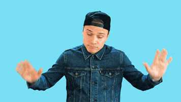 Video gif. Influence Matt Cutshall throws his hands in the air and shakes his head as if to say, “Fine, whatever.”