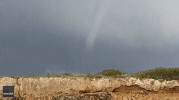 Onlookers Marvel As Waterspout Forms Off Coast of Cyprus