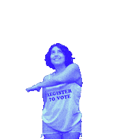 Video gif. Woman wearing a “Register to Vote” tank top over transparent background waves an arm over her head in an arch, revealing a sparkling rainbow that reads, “Revise su registro para votar.”