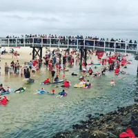Hundreds of Santas Take a Dip at Annual Christmas Surf Event in New South Wales