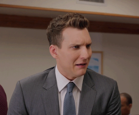 TV gif. Scott Michael Foster as Nathaniel in Crazy Ex-Girlfriend. He's in a suit and gives a scoff while raising his arms and saying, "I'm almost turned on!"