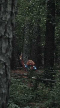 Waving Julia Garner GIF