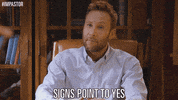 TV gif. Michael Rosenbaum as Buddy Dobbs in Impastor leans forward in a desk saying, "Signs point to us."