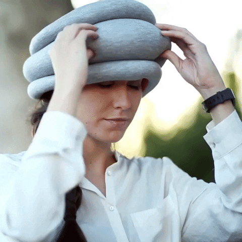 ostrichpillow giphygifmaker travel cozy nap GIF