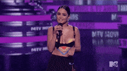 Vanessa Hudgens Shrug GIF by MTV Movie & TV Awards