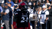 brush em off cincinnati bearcats GIF by University of Cincinnati Athletics