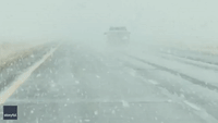 Heavy Snowfall Blocks Driver's View on Highway in Northeast Colorado