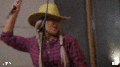 woman roleplaying as a cowgirl