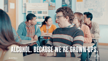TV gif. Jacob Houston as Victor sits in a classroom at his desk chair, talking to someone seriously, adjusting his glasses as he says, "Alcohol. Because we're grownups."