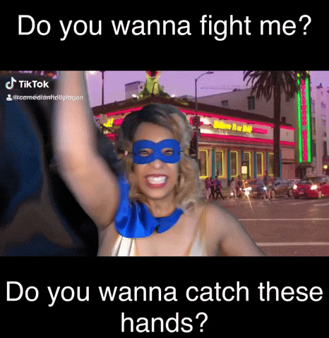 ComedianHollyLogan giphygifmaker mask superhero fighting GIF