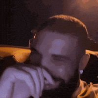 Aubrey Graham Laughing GIF