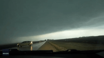 Storm Chaser Captures Intense Moment Lightning Strikes Car in Iowa